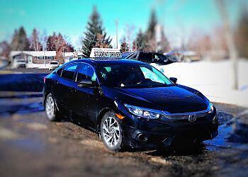 Calgary
écoles de conduite
A Proactive Driving School image 1