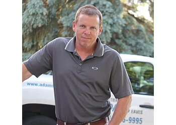 Montreal gutter cleaner Adam's Eaves Gutter/Eavestrough Specialists