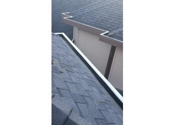 Surrey gutter cleaner Benchmark Cleaning Services
