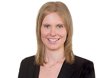 Terrebonne real estate agent Christian Roberge and Audrey Papineau - GROUPE SUTTON SYNERGIE INC.