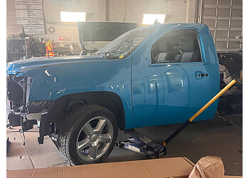 Edmonton auto body shop Cougar Paint & Collision Inc.