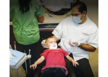 Oshawa cosmetic dentist Dr. Romani Nashid - SMILE VIEW DENTAL