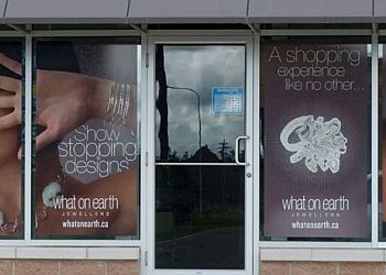 Fredericton Magasins de enseignes Dobbelsteyn Signs Ltd.