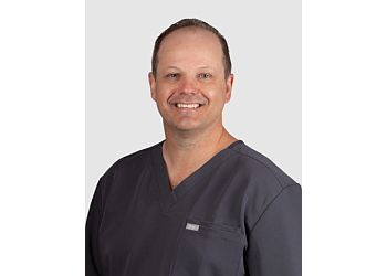 Dr. Aaron Cooper - NORTHFIELD DENTAL CLINIC