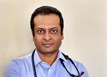 Dr. Akash Sinha - MAHOGANY MEDICAL Dr. Akash Sinha - Abbotsford, BC Endocrinologists - Doctor Portrait Image