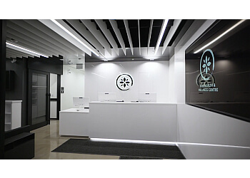 Calgary dermatologist Dr. Alim R. Devani - SKIN HEALTH & WELLNESS CENTRE