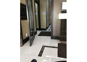 Brampton cosmetic dentist Dr. Amanpreet Chopra - THE FAMILY DENTIST