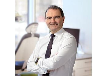 Dr. André Martel - Clinique D'Orthodontie André Martel