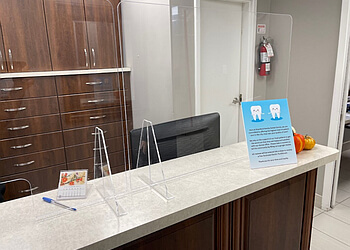 Brantford cosmetic dentist Dr. Azadeh Sharifzadeh - BRANTFORD FAMILY DENTAL CENTRE