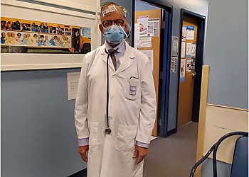 Dr. B. Datta - Regina, SK Pediatricians - Doctor Working Image