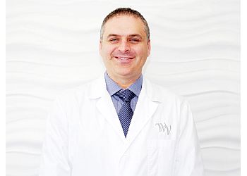Dr. Charles Triassi - West Village Dental Clinic