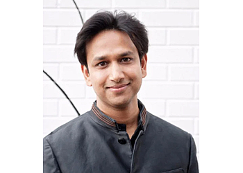 Calgary primary care physician Dr. Dave Sinha - OASIS HEALTH SYSTEM LTD