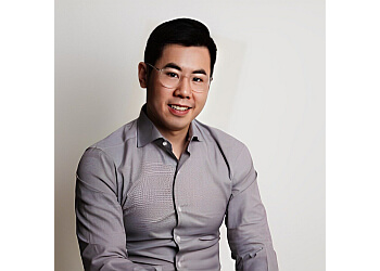 Grande Prairie dermatologist Dr. Eric Wong - REJUVADERM COSMETIC DERMATOLOGY & LASER image 1