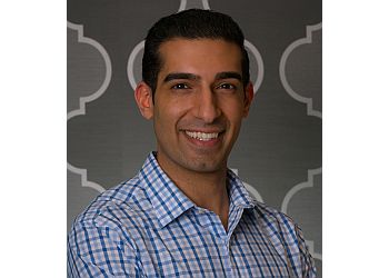 New Westminster cosmetic dentist Dr. Farhan Shivji - NEWEST SMILE DENTAL image 1