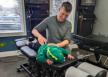 Dr. Gordon McPherson-Rayner, DC - BRUCE STREET FAMILY CHIROPRACTIC - Kitchener, ON Chiropractors - Doctor Working Image