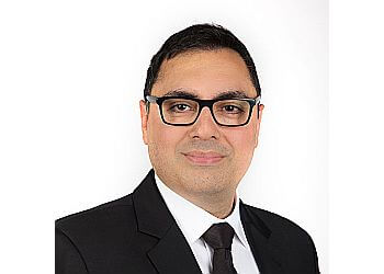 Dr. Gursharan Dhaliwal - BELMONT DENTAL CENTRE