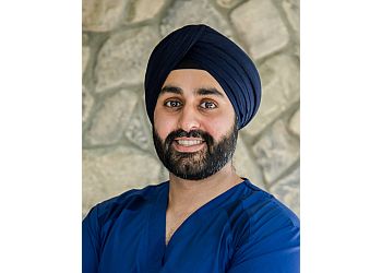 Dr. Harvinder Singh - SMILE CARE DENTAL CENTER