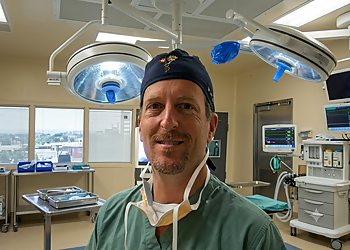 Dr. Howard Ginsberg, MD, PhD, FRCSC Dr. Howard Ginsberg, MD, PhD, FRCSC - Toronto, ON Neurosurgeons - Doctor Portrait Image