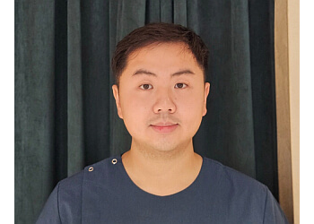 Langley dermatologist Dr. Ian Wong - Q DERMATOLOGY + AESTHETICS CENTRE image 1