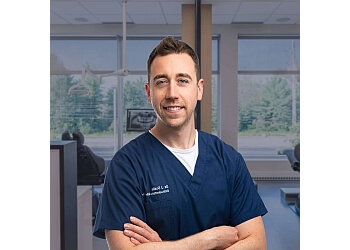 Blainville orthodontist Dr. John Scalia - Orthodontiste Orthoville