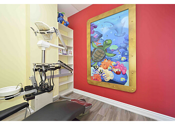 Hamilton children dentist Dr. John Woo - APPLE TREE DENTAL FOR KIDS