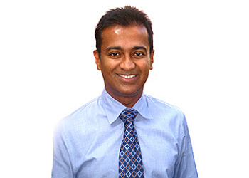 Richmond Hill dermatologist Dr. Mani Raman - THE CENTRE FOR DERMATOLOGY image 1