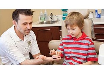 Oshawa cosmetic dentist Dr. Mehmet Danis - OSHAWA DENTAL HOUSE