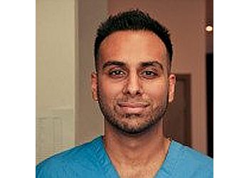 Kitchener dentist Dr. Neal Baweja - SOLAR DENTAL image 1