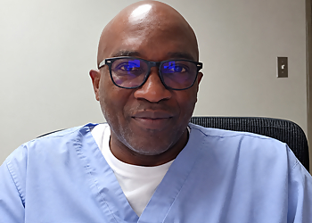 Dr. Olubukola Apantaku - Red Deer, AB Gynecologists - Doctor Portrait Image