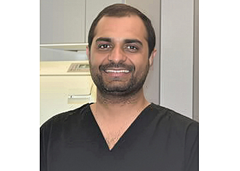 Kingston dentist Dr. Omar Abdullah - DENTISTRY ON QUEEN