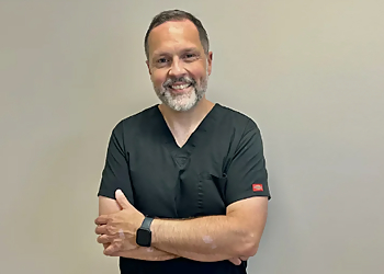 St Johns chiropractor Dr. Philip Locke, B.Sc., C.Ped., D.C. - DISCOVER CHIROPRACTIC