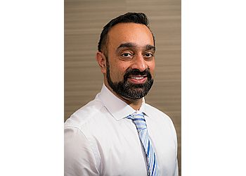 Abbotsford dentist Dr. Rajinder hundal - SUMAS MOUNTAIN VILLAGE DENTAL image 1