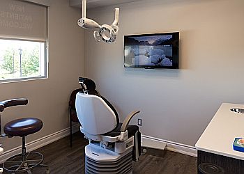 Milton dentist Dr. Raju Sarna - HAWTHORNE VILLAGE DENTAL CARE