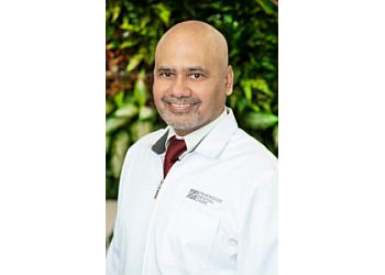 Dr. Ravi Sharma - PINEWOOD DENTAL CARE