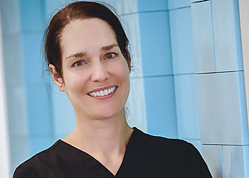 Dr. Richelle Bedier - NORTH MAIN FAMILY DENTAL Dr. Richelle Bedier - Airdrie, AB Children Dentists - Doctor Portrait Image