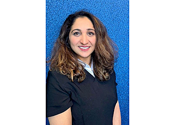 Burnaby cosmetic dentist Dr. Ritu Kumar - SIMPLY WELLNESS DENTAL BURNABY