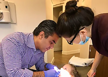 Dr. Sam Naddaf - Port Coquitlam, BC Dentists - Doctor With Patient Image