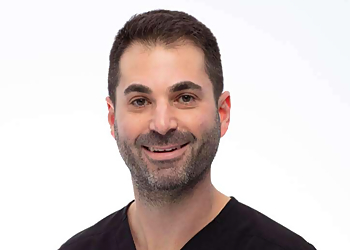 Dr. Sean Ostro - BRITE BITE KIDS DENTAL & ORTHODONTICS Dr. Sean Ostro - Vaughan, ON Children Dentists - Doctor Portrait Image