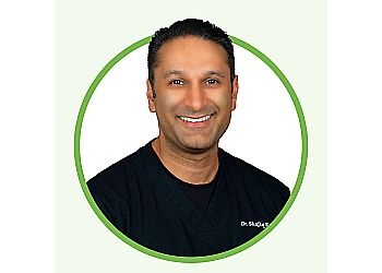 Langley cosmetic dentist Dr. Shafiq Kara - SAGE DENTAL IMPLANT & SMILE CENTRE image 1