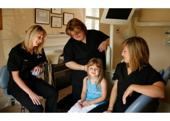 Orangeville dentist Dr. Tejus Raval - HERITAGE DENTAL CENTRE