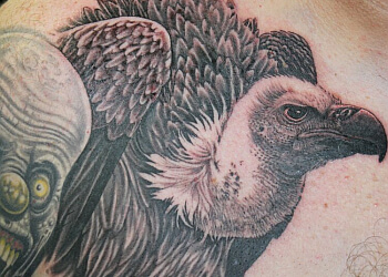 Tattoo artist Mike Wheeler shades a tattoo at Glenns Tattoo Service  The  Daily Tar Heel