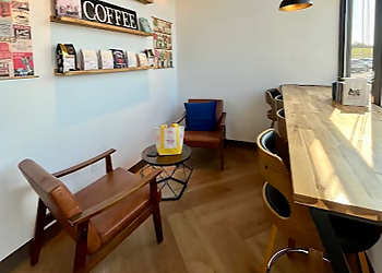Ground Press Coffee & Books - Airdrie, AB Cafe - Restaurant Interior Image