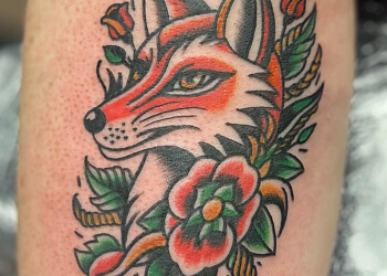 Red Deer Salons de tatouage Ink'd Gunz Tattoo