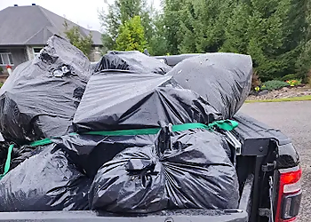 North Bay Collecte des ordures Man & A 1/2 Ton