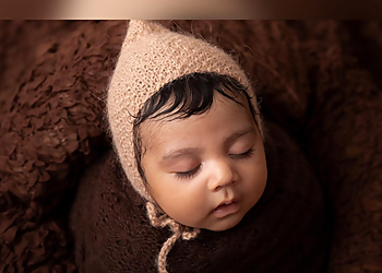 Surrey babies and family photographer Memories By Snehal