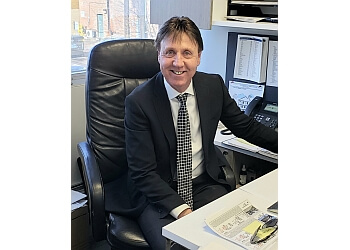 Edmonton Agents Immobiliers Norm Cholak of RE/MAX River City