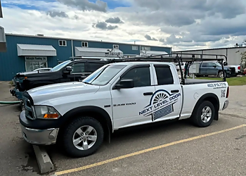 Next Level Door Inc. Next Level Door Inc. - Airdrie, AB Garage Door Repair - Service Vehicle Image