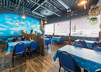 Pelican Pier - Calgary, AB Fish And Chips - Restaurant Interior Image