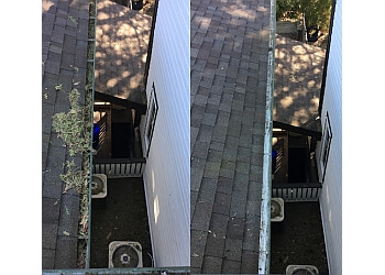 Surrey gutter cleaner Precision Gutters Ltd.
