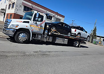 Montreal towing service Remorquage Ménard